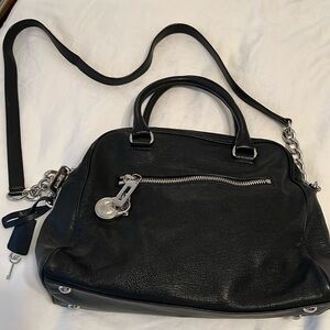 MK leather bag with silver hardware. Clean inside and no visible stains.